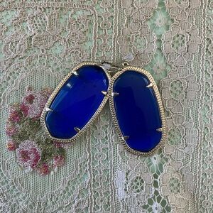 Kendra Scott Cobalt Blue Earrings with gold.